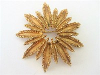 Golden Starburst Brooch  by Avon