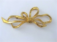 Gold Ribbon Bow Brooch Pin  by Trifari